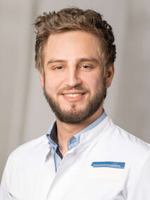 Portrait von Dr. med. univ. Lukas Rangger