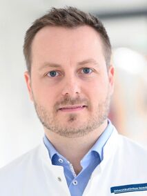 Portrait von Dr. med. Dr. med. univ. Jörg Kaiser