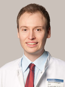 Portrait von Dr. med. Dr. med. univ. Tim Godel Portrait von Dr. med. Dr. med. univ. Tim Godel