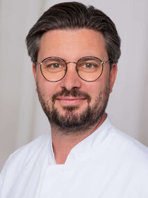 Portrait von Dr. Dominic Störzinger