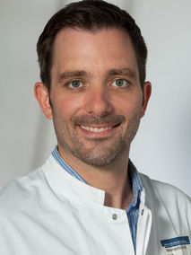 Portrait von Dr. med. Moritz Scherer, FEBNS